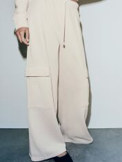Акция на Спортивні штани жіночі на флісі Zara 596971359 L Молочні от Rozetka