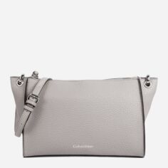 Акція на Сумка крос-боді через плече жіноча середня Calvin Klein 453294009 Сіра від Rozetka
