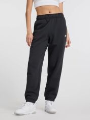 Акція на Спортивні штани на флісі жіночі New Balance Essentials Fleece WP41502BK XL Чорні від Rozetka