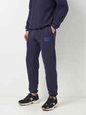 Акція на Спортивні штани утеплені чоловічі Umbro Rlxd Jogger 66420U-4BK M Темно-сірі від Rozetka