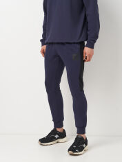 Акція на Спортивні штани утеплені чоловічі Umbro Terrace Jogger 66541U-9T7 2XL Темно-сірі від Rozetka