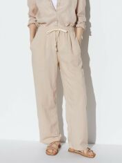 Акція на Штани жіночі Uniqlo 361224309 S Бежеві від Rozetka