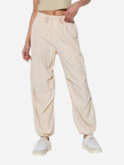 Акція на Штани жіночі Uniqlo 371596070 XS Молочні від Rozetka