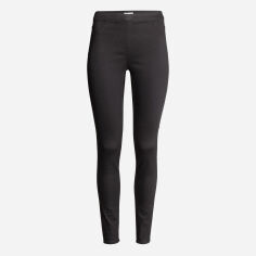 Акція на Штани жіночі H&M 0356174 34 Чорні блиск від Rozetka