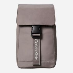 Акція на Сумка слінг через плече чоловіча Calvin Klein 391410111 Коричнева від Rozetka