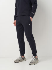 Акція на Спортивні штани чоловічі Calvin Klein Jeans 11432.3 L Темно-сині від Rozetka