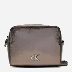 Акція на Сумка крос-боді через плече жіноча маленька Calvin Klein 924969190 Срібляста від Rozetka