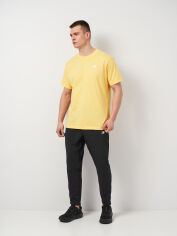 Акція на Спортивні штани чоловічі New Balance Sport Woven MP51904BK M Чорні від Rozetka