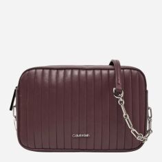 Акція на Сумка крос-боді через плече жіноча маленька Calvin Klein K60K613078-VH2 Темно-бордова від Rozetka