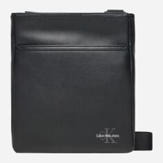Акція на Сумка планшет чоловіча маленька Calvin Klein K50K513032-BEH Чорна від Rozetka