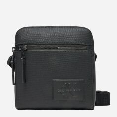 Акція на Сумка планшет чоловіча маленька Calvin Klein K50K512996-BEH Чорна від Rozetka