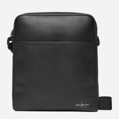 Акція на Сумка планшет чоловіча середня Calvin Klein K50K512574-BEH Чорна від Rozetka