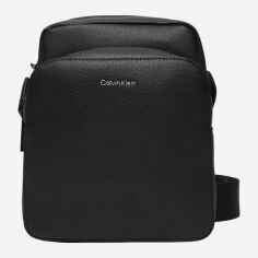 Акція на Сумка планшет чоловіча маленька Calvin Klein K50K512763-BEH Чорна від Rozetka