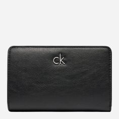 Акція на Гаманець жіночий для карток Calvin Klein K60K613075-BEH Чорний від Rozetka
