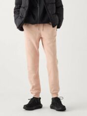 Акція на Спортивні штани теплі жіночі Uniqlo 917312691 S Рожеві від Rozetka