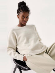 Акція на Джемпер жіночий Uniqlo 338168174 XS Молочний від Rozetka