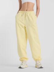 Акція на Спортивні штани жіночі New Balance Nb Athletics WP41513 XL Жовті від Rozetka
