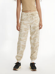 Акція на Штани жіночі Levi`s 491299684 XS Бежеві від Rozetka