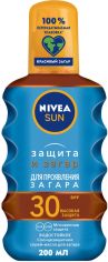 Акція на Солнцезащитное масло Nivea Защита и загар SPF30 с маслами 200 мл (4005800118784) від Rozetka UA