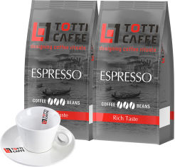 Акція на Набор TOTTI Caffe Кофе в зернах Espresso 1 кг х 2 шт + Чашка с блюдцем для капучино (8720254065991) від Rozetka UA