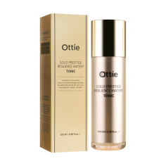 Акція на Тонік для пружності шкіри обличчя Ottie Gold Prestige Resilience Watery Tonic, 130 мл від Eva