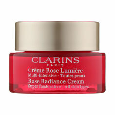 Акція на Відновлювальний денний крем для обличчя Clarins Rose Radiance Cream Super Restorative для всіх типів шкіри, проти зморщок, 50 мл від Eva