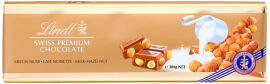 Акція на Шоколад молочний Lindt Milk Hazelnut Gold з фундуком 300 г від Rozetka