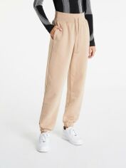 Акция на Спортивные штаны на флисе женские Nike Fleece Pant DQ5887-200 L Бежевые от Rozetka