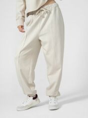 Акція на Спортивні штани жіночі Outhorn Trousers Cas F175 OTHSS23TTROF175-11S M Бежеві від Rozetka