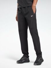Акція на Спортивні штани чоловічі Reebok Ts Thermowarm+Grphn GT3251 L Black від Rozetka