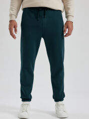 Акція на Спортивні штани чоловічі DeFacto A6468AX-GN1079 XL D.Green від Rozetka